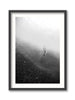 Black and white framed artwork of a diver underwater with a blurred background
